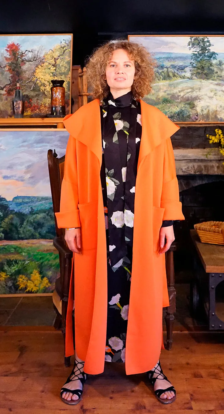 A MELODY COAT IN ORANGE