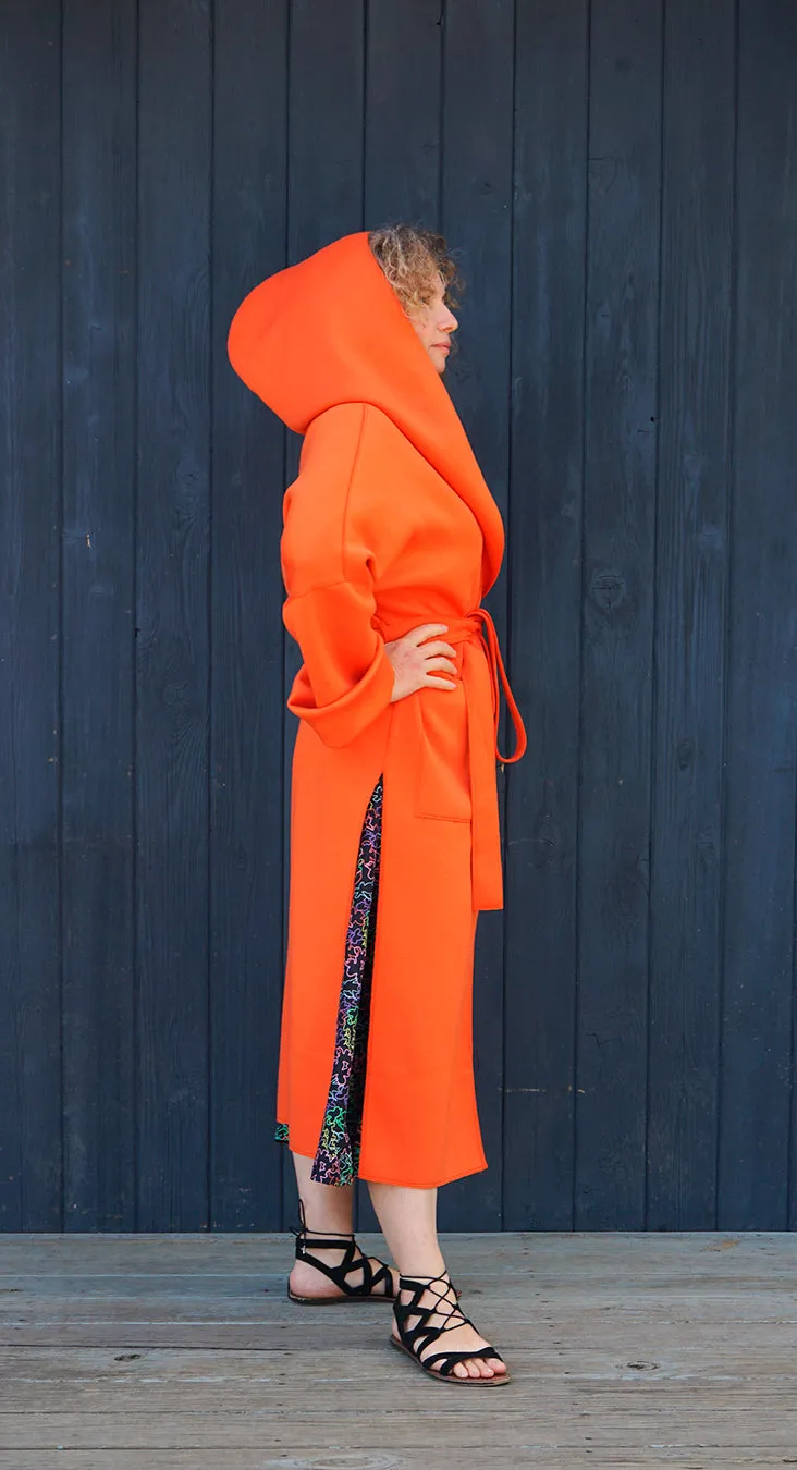 A MELODY COAT IN ORANGE
