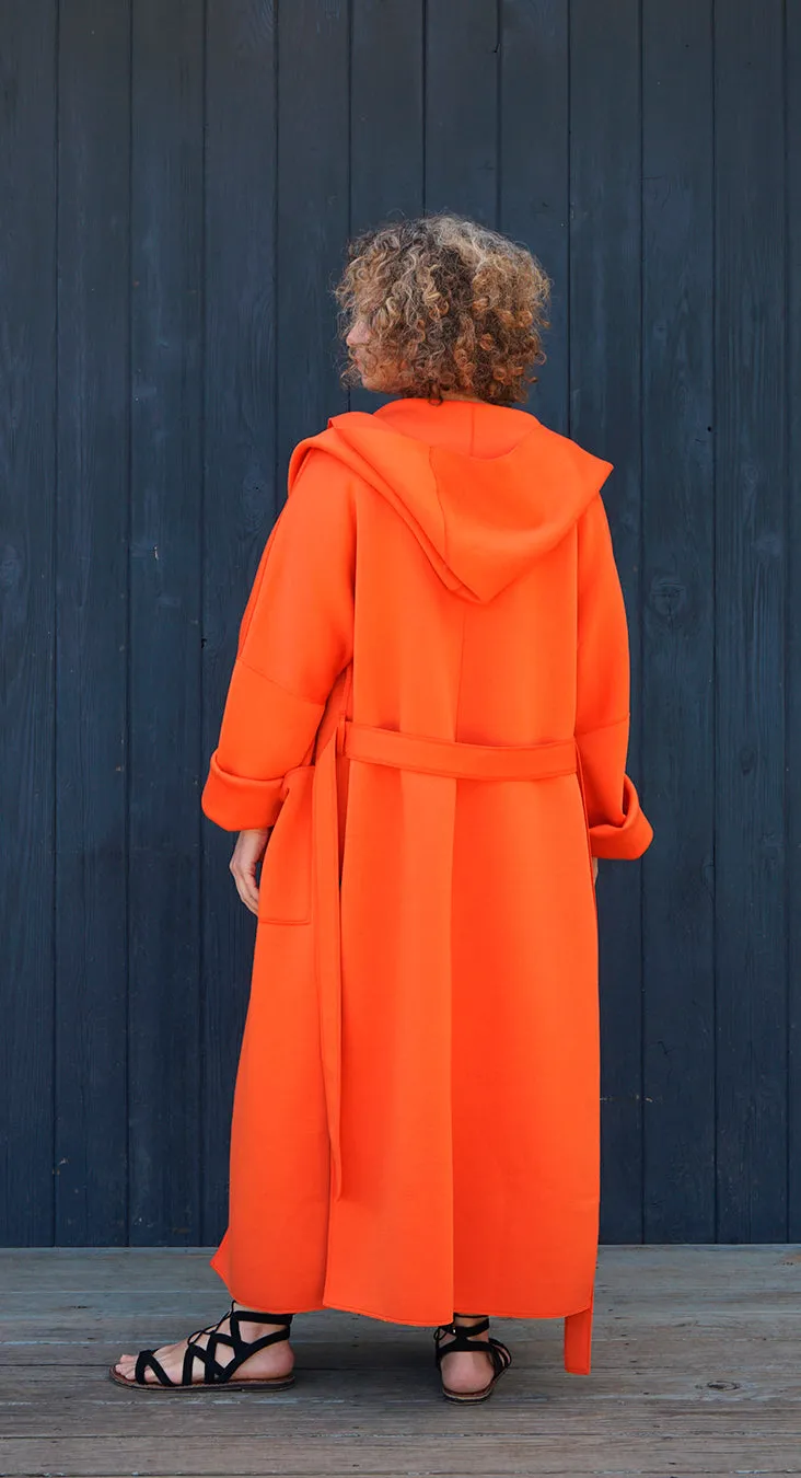A MELODY COAT IN ORANGE