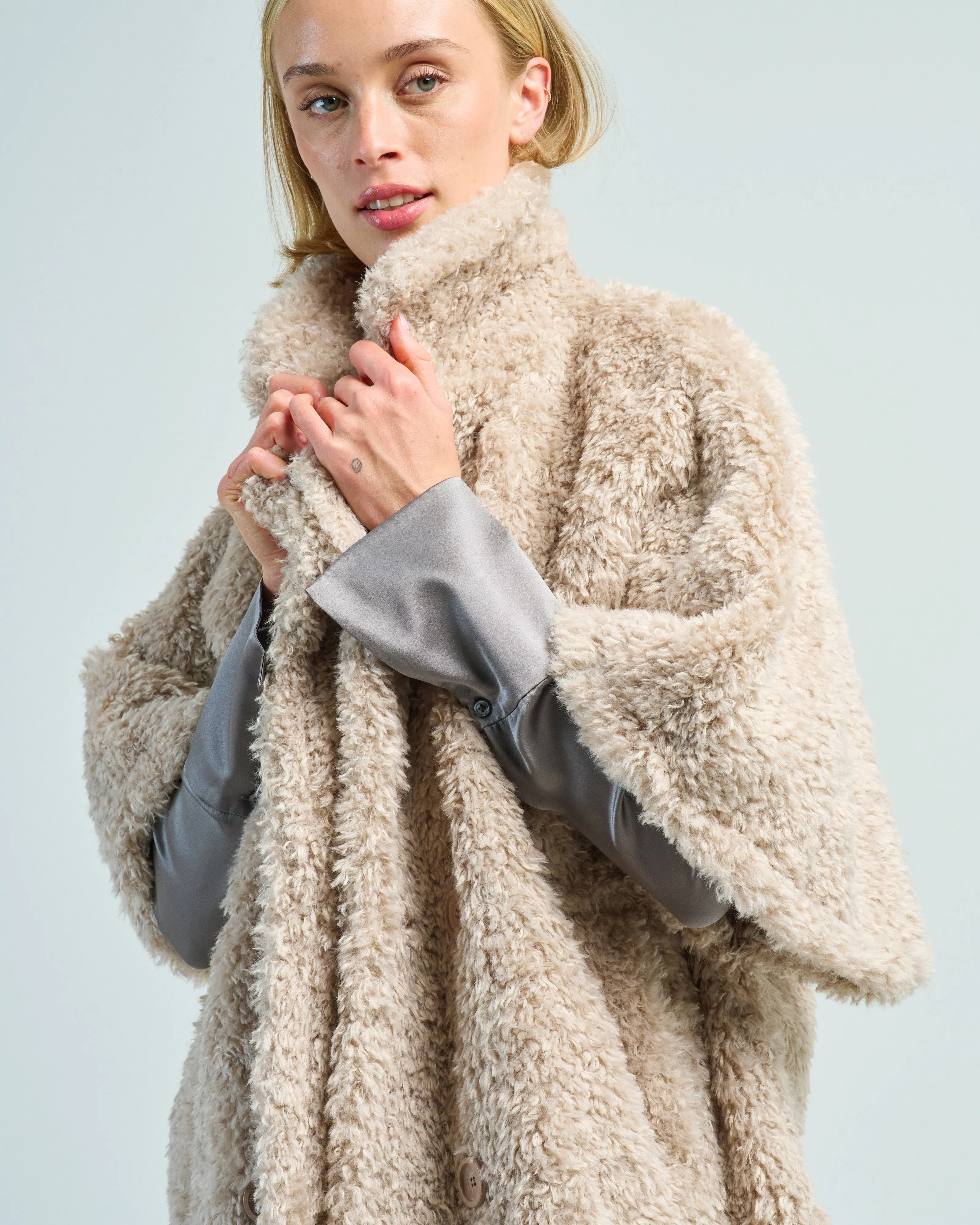 curly faux fur double breasted cape