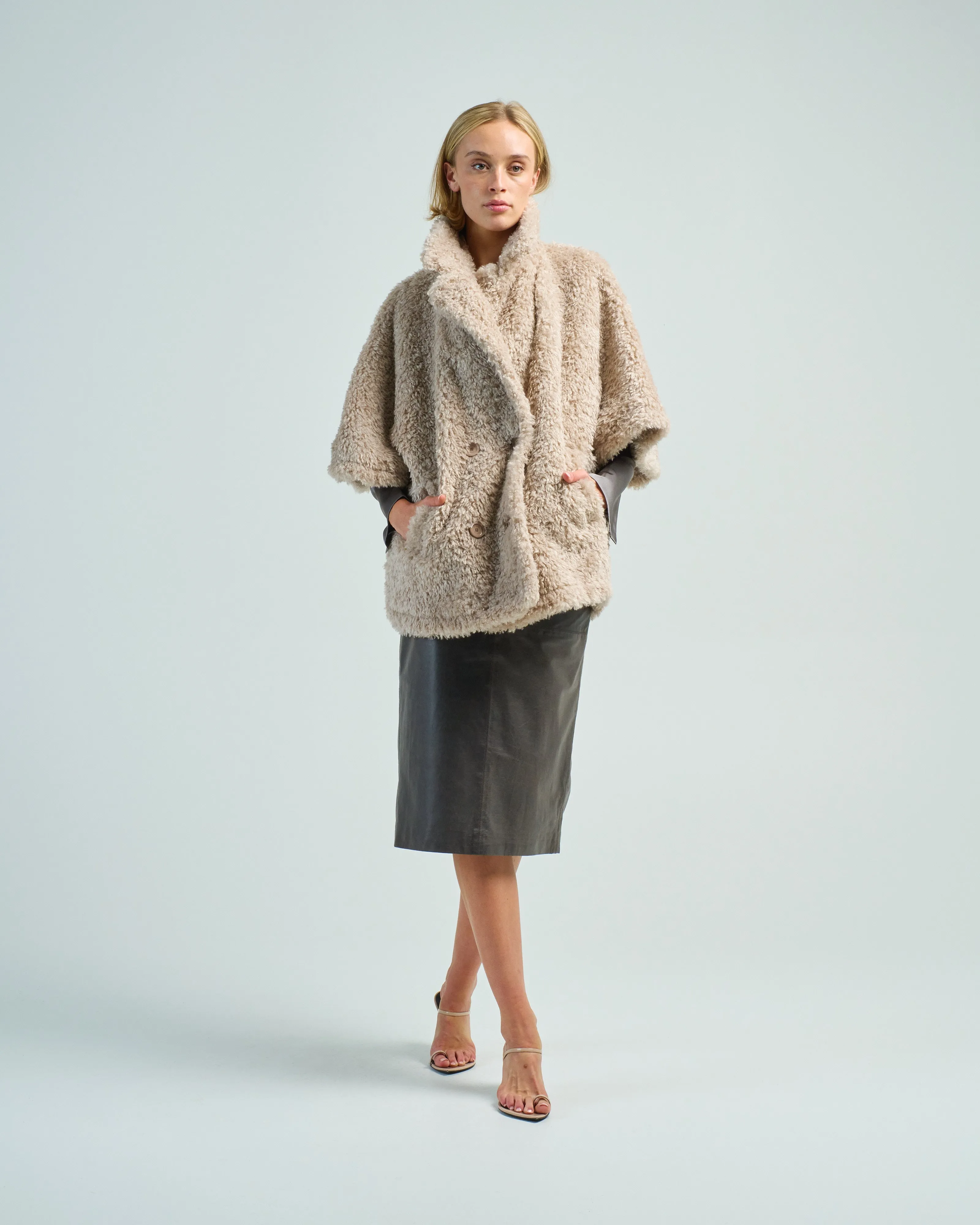 curly faux fur double breasted cape