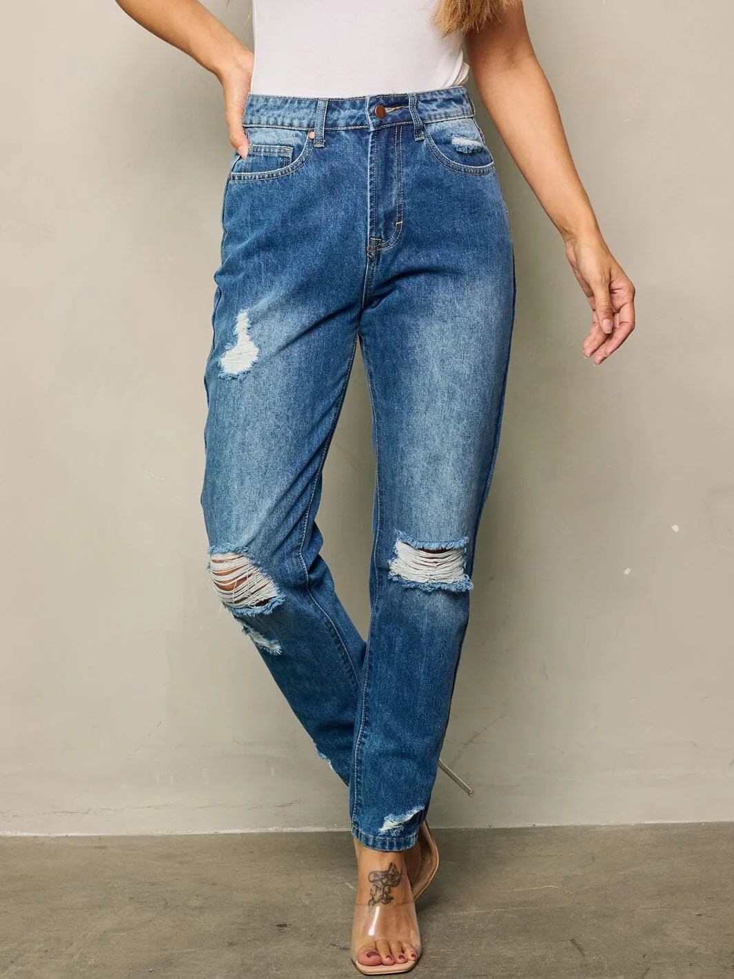 WOMEN'S BUTTON CLOSURE WASHED DISTRESSED DENIM PANTS